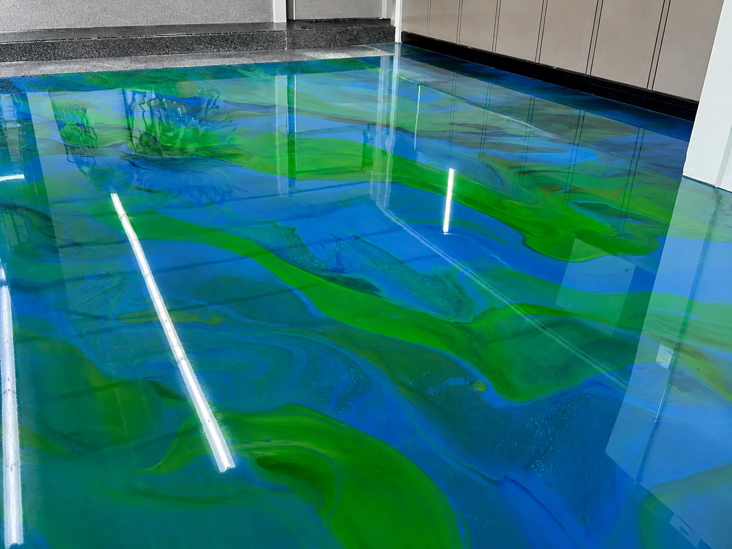 Blue and green metallic epoxy pour